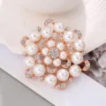 Broche ronde en perles et strass or rose accessoire de mode fête cadeau bijoux article - Or rose