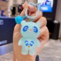Close-up detail of the cute blue panda acrylic keychain pendant showcasing glossy finish and cute design. - Blue