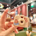 Detailed view of cute capybara projection camera keychain, glowing bag pendant toy gift. - Capybara Camera - Bathing