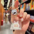 Cute Kiki acrylic quicksand keychain pendant lovely floating doll bag charm key ring gift - White