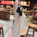 Cinturino da polso per telefono in strass di lusso cordino di cristallo brillante - Carta Trasparente / Nero