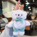 Cute plush bear keychain with green bow and overalls, perfect fluffy bag charm accessory. - 1 Piece / Pink With Green Bowtie