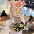 Transparent acrylic lucky cat keychain oil liquid gold glitter quicksand bag charm - Black