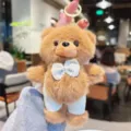 Detailed view of cute brown plush bear keychain with bow, soft stuffed bag charm accessory. - 1 Piece / Brown With Beige Bowtie