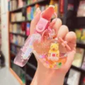 Cute floating airplane capybara liquid acrylic keychain detail charm for stylish bag decoration. - Pink Airplane Capybara Style / Pink
