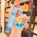 Cute quicksand acrylic floating capybara keychain liquid bag charm accessory gift item - Blue Airplane Capybara Style / Blue