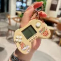 Cute capybara game console keychain, mini electronic toy and stylish bag pendant gift for kids. - Gamepad Style—HAPPY