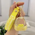 Cute yellow liquid quicksand backpack keychain with floating doll detail view for bags and keys - Yellow