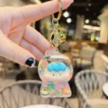 Cute fruit quicksand liquid keychain with clear character figurine, gold keyring pendant. - Glitter Multicolor