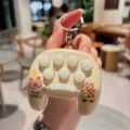 Cute capybara game console keychain stress relief toy bag pendant gift key ring - Mini Whack-A-Mole—Yellow Car