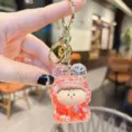 Acrylic quicksand keychain with cute cartoon character pendant, glitter liquid toy bag charm. - Red