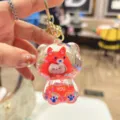 Cute transparent quicksand bear keychain, shiny glitter liquid bag pendant for students and friends. - Red