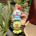 Cute double layer rotating octopus keychain, stress relief toy and fun bag charm pendant. - Blue and Green