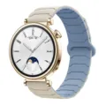 Smartwatch with gold case and dual-color magnetic silicone strap, stylish digital dial. - Antique White & Mist Blue