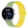 Detail view of the dual-color silicone magnetic loop watch strap in green and yellow. - 20mm / 19# Mint with Light Yellow