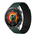 Detailed view of the magnetic silicone watch strap featuring a sleek metallic watch design. - 18mm / Dark Green with Black