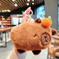 Cute capybara plush keychain coin purse, soft stuffed animal bag charm for daily use. - Orange on Head Wallet
