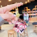 Close-up detail of the Chinese cartoon character Nezha Rubik's cube keychain pendant. - Nezha Cube - Sea Triumph