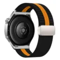Detailed view of 22mm striped nylon braided watch strap with metal folding magnetic clasp - 22mm / Black and Orange Striped