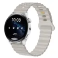 Close-up detail view of the silicone watch band featuring a flexible ripple design for smartwatches. - 20mm / Off White