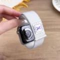 Grey nylon loop watch band compatible with Apple Watch, featuring cute purple bow patch. - 44/45/46/49MM Universal / Official Starlight (Bow)