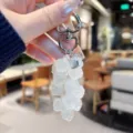 Acrylic rose cluster bag charm and keychain detail, sparkling translucent floral pendant accessory. - Transparent Rose String - White