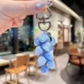 Iridescent crystal heart cluster keychain, fashionable bag charm and stylish phone accessory. - Colorful Heart String - Blue