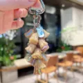 Iridescent lily of the valley keychain, colorful flower bag charm pendant accessory. - Colorful Lily of the Valley String - Coffee