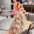 Portachiavi con nappa soffice e numero, simpatico accessorio per borsa in peluche DIY. - Numero Caffè Nappina