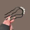 Elegant black U-shaped hair fork with faux pearls, perfect for chic buns and updos securely. - 5-Pearl Wave Hair Comb / Black