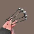 Black metal U-shaped hair fork with grey pearl beads, elegant styling tool for buns. - Rhinestone Pearl Hairpin / Black