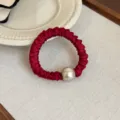Burgundy satin scrunchie with large silver metallic pearl bead, elegant hair tie accessory. - Red