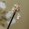 Traditional Chinese style wooden hair stick with pink flower and tassel pendant. - Pink Peach Blossom Green Leaf Tassel Wooden Hair Stick