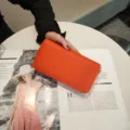 Orange pebbled leather long zip-around wallet for women, stylish multi-slot clutch purse. - 19*10cm / Orange