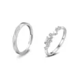 Adjustable couple rings set featuring a wave band and a crystal planet star design. - Planet Couple Rings