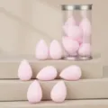 7pcs mini makeup sponge set with clear cylinder case, pink teardrop cosmetic puff for flawless look. - 7 Pieces/Pack - Pink