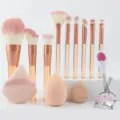 Close-up detail view of the professional 13-piece makeup brush set and curler. - Full 13 Piece Set (Orange)
