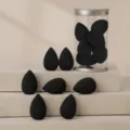 7pcs black mini makeup sponge set in clear PVC cylinder, soft blending beauty puffs. - 7 Pieces/Pack - Black