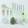 Detailed view of green handle makeup brushes, soft sponges, and curler tool set closeup. - Full 13 Piece Set (Green)