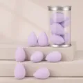 Mini purple makeup sponge set with transparent cylinder container, soft blending face puff tools. - 7 Pieces/Pack - Purple