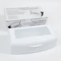 Plastic sterilizing tray for nail and beauty care tools with clear lid and removable basket. - White
