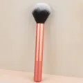 Soft mini blush powder makeup brush with rose gold ferrule and synthetic fibers for easy blending. - RT Powder Brush Pink