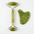 Natural green jade facial roller and gua sha set for skin massage and beauty care tools. - 2-Piece Jade Roller Set / Emerald