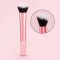 Mini blush makeup brush with pink handle and soft ombre bristles for smooth and even makeup. - RT Angled Round Foundation Brush Transparent Pink