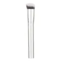 Angled makeup brush with soft synthetic bristles and silver handle for smooth application. - Silver
