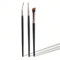 3 pieces professional makeup brush set featuring curved eyeliner and angled eyebrow tools. - Black & Gold