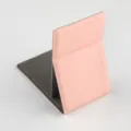 Portable folding makeup mirror in pink leather with dark grey stand for desktop use details. - Pink