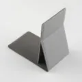 Detail view of the grey folding makeup mirror stand, showing the portable PU leather texture. - Gray