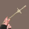 Gold sword hair stick for women, vintage metal hairpin for Hanfu and buns, stylish hair accessory. - Irregular Waterdrop Sword Style / Gold