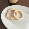 Elegant satin hair scrunchies for women, soft elastic hair ties and ponytail holders for daily wear. - 2 Pieces/Pack / Beige